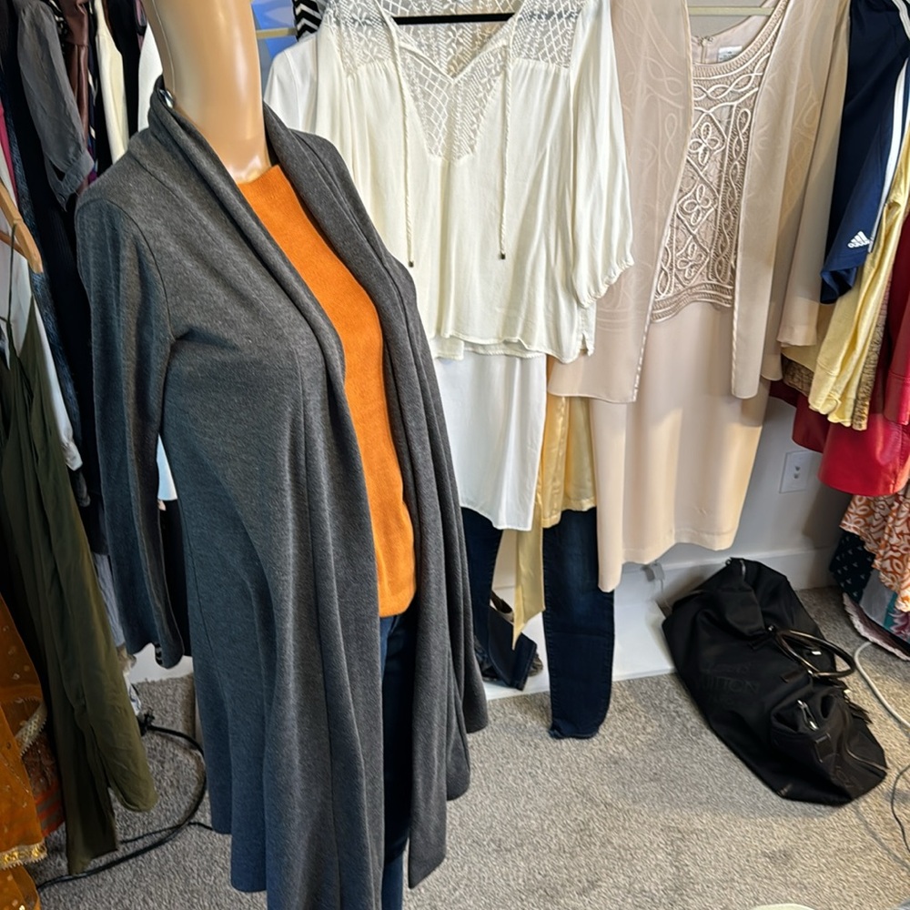 PTP 19”. Gray shrug with longer front tails, which can be tied at waist